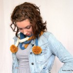 Long Skinny Knitted Scarf With Pom Poms by Maya